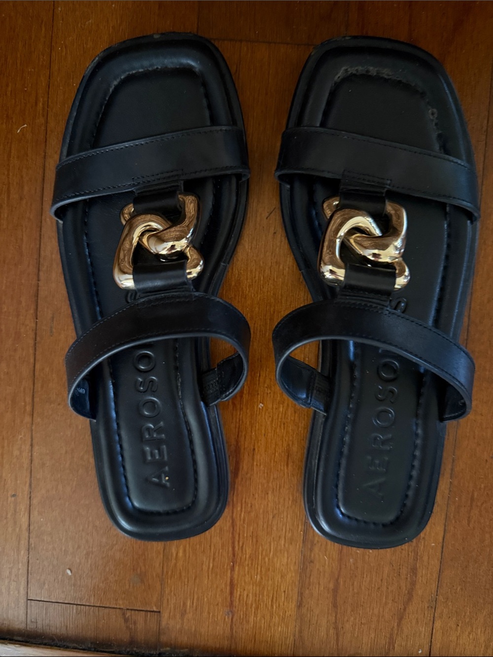 AEROSOLES Black Slip-On Sandals with Gold Chain Detail